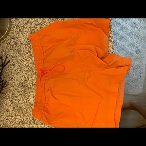 orange trek shorts